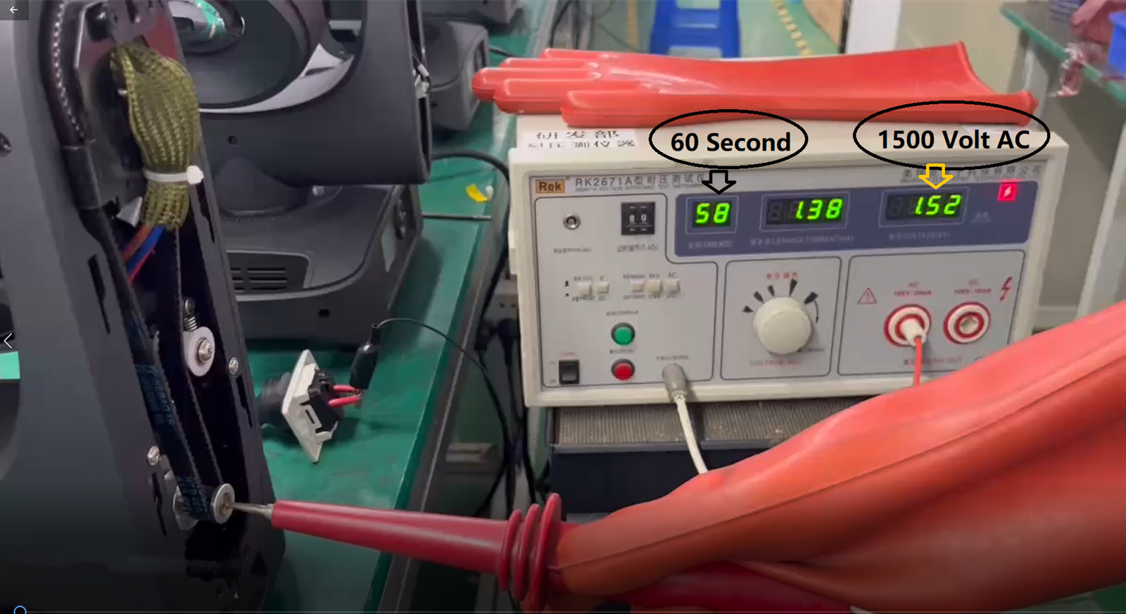 Electrical testing equipment, A voltage testing machine with red probes and a 60-second timer